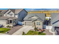 Charming home featuring a low-maintenance yard and beautiful mountain views at 2237 Barela Dr, Berthoud, CO 80513