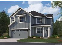 Charming two-story home featuring gray siding, a gray garage door, and professionally landscaped front yard at 13729 Daffodil Pt, Parker, CO 80134