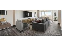 Inviting living room featuring contemporary furnishings and a bright, open layout at 2225 Buchtel Blvd # 1003, Denver, CO 80210