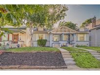 Charming home featuring a well-maintained front yard and welcoming entrance and beautiful curb appeal at 575 N Marion St, Denver, CO 80218