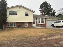 Charming two-story home with a well-maintained front yard and beautiful landscaping. A warm and inviting space to call home at 760 Gardenia St, Golden, CO 80401