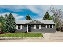 Charming single-story home with a well-manicured front yard and inviting entrance at 5108 S Pennsylvania St, Littleton, CO 80121
