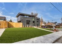 Modern two-story home with a well-maintained lawn and contemporary design at 1459 W 42Nd Ave, Denver, CO 80211