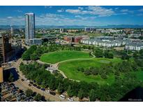 Breathtaking aerial view of the city skyline, green park and distant mountains at 1700 Bassett St # 1808, Denver, CO 80202