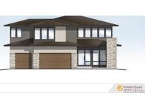 Two-story home boasting a tandem three-car garage, neutral colors, and stone detailing at 945 Saint Andrews Ln, Louisville, CO 80027