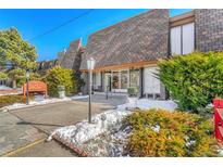 Attractive condo complex entrance, with a well-maintained landscape at 8330 Zuni St # 219, Denver, CO 80221