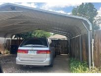 Car parked under sturdy metal carport structure at 5040 Tennyson St, Denver, CO 80212