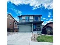 Charming two-story home with a well-maintained front yard and a welcoming entrance at 3173 Youngheart Way, Castle Rock, CO 80109