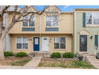 Charming townhome featuring a well-maintained yard and inviting entryways at 1671 S Idalia Cir # D, Aurora, CO 80017
