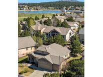 Beautiful single-Gathering home with an attached garage situated in a well-maintained neighborhood near a serene lake at 1660 Moveen Hts, Monument, CO 80132