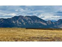 Picturesque land with mountain views and an open field, perfect for building a dream home in a serene setting at 1747 High Plains Ct, Superior, CO 80027