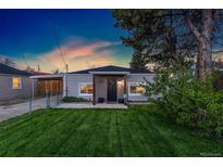 Charming single-story home with well-manicured lawn and inviting front porch at 109 S Fulton Ave, Fort Lupton, CO 80621