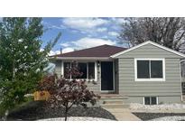 Charming home featuring stylish gray siding, a new roof, and refreshed landscaping at 4844 Vallejo St, Denver, CO 80221