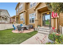Charming front porch with brick patio, perfect for outdoor seating and enjoying the neighborhood view at 3668 Pecos Trl, Castle Rock, CO 80109