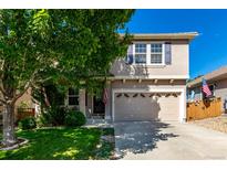 Charming two-story home featuring a two-car garage and a well-maintained lawn, perfect for suburban living at 3505 Dinosaur St, Castle Rock, CO 80109