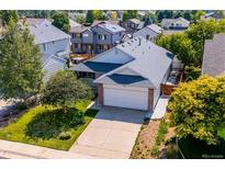 Aerial view of house and surrounding neighborhood, showcasing the community and landscape at 11228 W Progress Ave, Littleton, CO 80127