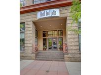 Close up of the West End Lofts entrance, featuring tiled steps and a decorative entrance way at 1435 Wazee St # 408, Denver, CO 80202