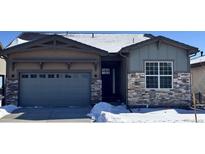 Charming single-Gathering home with a two-car garage and stone accents at 2978 Newfound Lake Rd, Berthoud, CO 80513