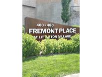 Fremont Place at Littleton Village community sign surrounded by lush green landscaping at 420 E Fremont Pl # 203, Centennial, CO 80122
