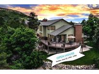 Stunning two-story home featuring a spacious deck perfect for outdoor entertaining and relaxing at 3254 Red Tree Pl, Castle Rock, CO 80104