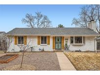 Charming single-story home with a well-maintained front yard, a welcoming entrance, and a beautiful, freshly painted exterior at 1748 S Locust St, Denver, CO 80224