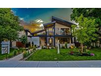 Striking contemporary home with architectural design and professionally landscaped front yard at 1175 S Jackson St, Denver, CO 80210