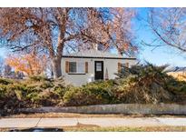 Charming bungalow with updated facade, landscaping, and a fenced yard at 3195 S Clarkson St, Englewood, CO 80113