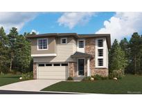 Beautiful two-story home featuring a stone and siding exterior with a two-car garage and manicured lawn at 454 S Rifle St, Aurora, CO 80017