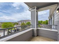 Relax on your private balcony overlooking the neighborhood at 5255 Memphis St # 224, Denver, CO 80239
