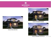 Three modern home elevations are shown in this rendering at 21031 E 63Rd Dr, Aurora, CO 80019