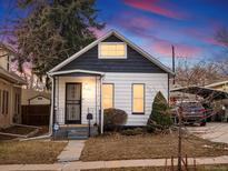 Charming craftsman home with a well-manicured lawn at 2537 Chase St, Edgewater, CO 80214