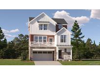 Two-story farmhouse-style home with stone accents and a two-car garage at 2076 S Haleyville Way, Aurora, CO 80018