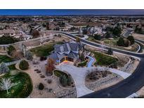 Luxury home on a large lot with a circular driveway at 15102 Prairie Pl, Broomfield, CO 80023