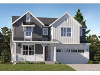 New construction home showcasing a two-story design with a welcoming front porch and an attached two-car garage at 747 Raindance St, Erie, CO 80516