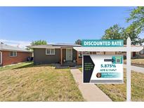 Charming single-story home with well-maintained lawn and appealing curb appeal at 1742 S Alcott St, Denver, CO 80219