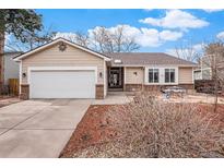Charming single-story home featuring a two-car garage, cozy patio, and well-maintained landscaping at 16084 E Lehigh Cir, Aurora, CO 80013