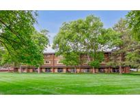 Inviting condo building with spacious lawns and mature shade trees at 3161 Madison Ave # R313, Boulder, CO 80303