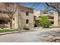 A charming multi-level home featuring neutral colors, a well-kept lawn, and mature trees in a serene neighborhood at 2938 Kalmia Ave # 6, Boulder, CO 80301