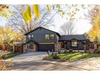 Charming two-story home with stone accents and a well-maintained front yard at 4269 Carter Trl, Boulder, CO 80301