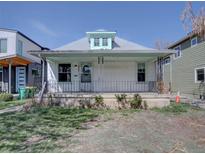Charming bungalow with a front porch and unique architectural details, perfect for a cozy home at 2963 S Lincoln St, Englewood, CO 80113