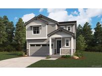 Charming two-story home featuring a gray exterior, front porch, attached garage, and landscaped yard at 11181 Mount Emma Dr, Englewood, CO 80112