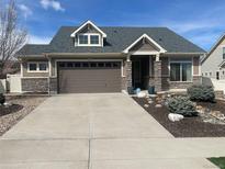 Charming single-Gathering home with a well-maintained lawn and inviting curb appeal at 19753 E 54Th Ave, Denver, CO 80249