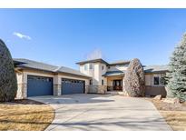 Stately home featuring a circular driveway and a three-car garage at 4405 Fairway Ln, Broomfield, CO 80023