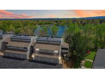 Stunning end unit offers garage parking, near a lake and neighborhood playground at 10550 W Jewell Ave # 301, Lakewood, CO 80232