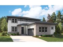 Two-story home with gray and white siding, attached garage, and landscaping at 1141 Joseph Pl, Erie, CO 80026