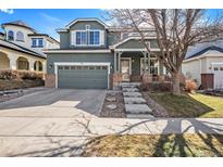 Charming two-story home with a well-maintained front yard and a two car garage in a desirable neighborhood at 9756 E 113Th Ave, Commerce City, CO 80640
