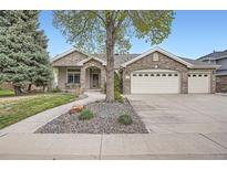 Beautiful single-Gathering home featuring a manicured lawn and a three-car garage at 3462 W 109Th Cir, Westminster, CO 80031