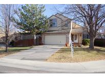 Two-story house with attached garage and landscaping at 3342 W 114Th Pl, Westminster, CO 80031