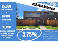 Home exterior featuring a well-maintained fenced yard with a sidewalk leading to the entry at 8039 Wolff St # E, Westminster, CO 80031