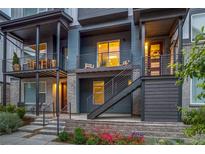 Inviting exterior view showcasing a modern facade with multiple levels and beautiful landscaping at 5185 Vivian St, Wheat Ridge, CO 80033